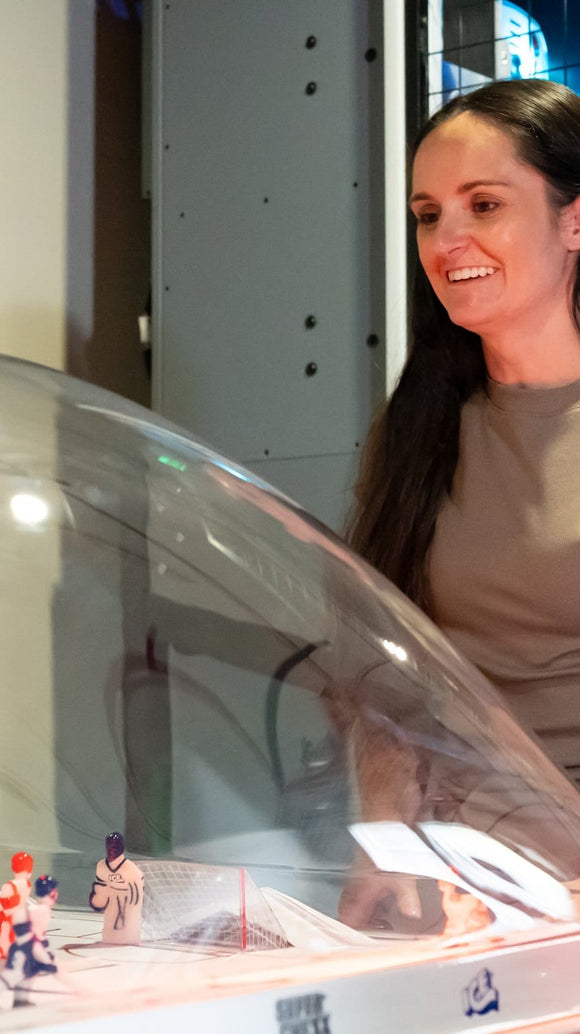 Woman playing Super Chexx Lite